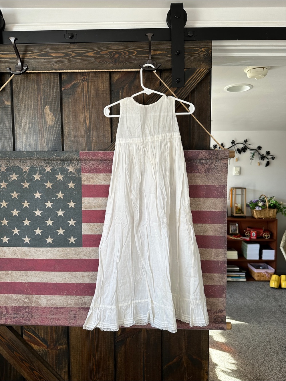 Child/ doll dress.  Cotton. Three button back with ruffled bottom .